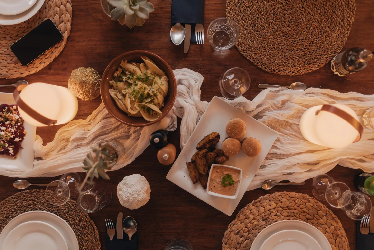 Overhead view of freshly prepared regional meal at Limusic residential recording studio in Limoux, southern France, featuring local dishes and wine
